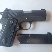 Prohibited .45 caliber semi-automatic pistol seized.