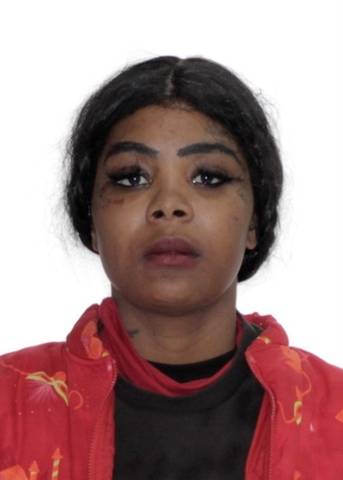 Close up photo of Shanique Bryan wearing a red jacket and black shirt