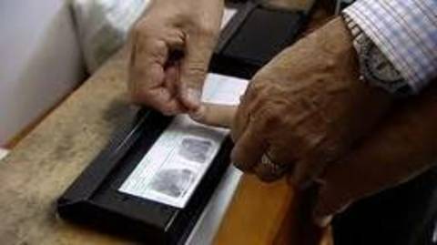 Person being fingerprinted