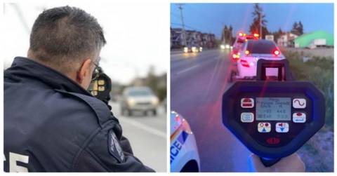 An RCMP member holding a vehicle speed checking equipment